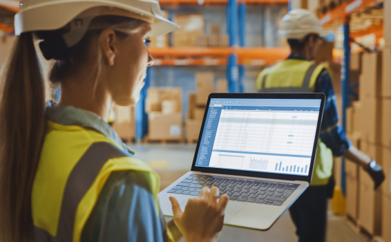 Employee using technology to manage warehouse